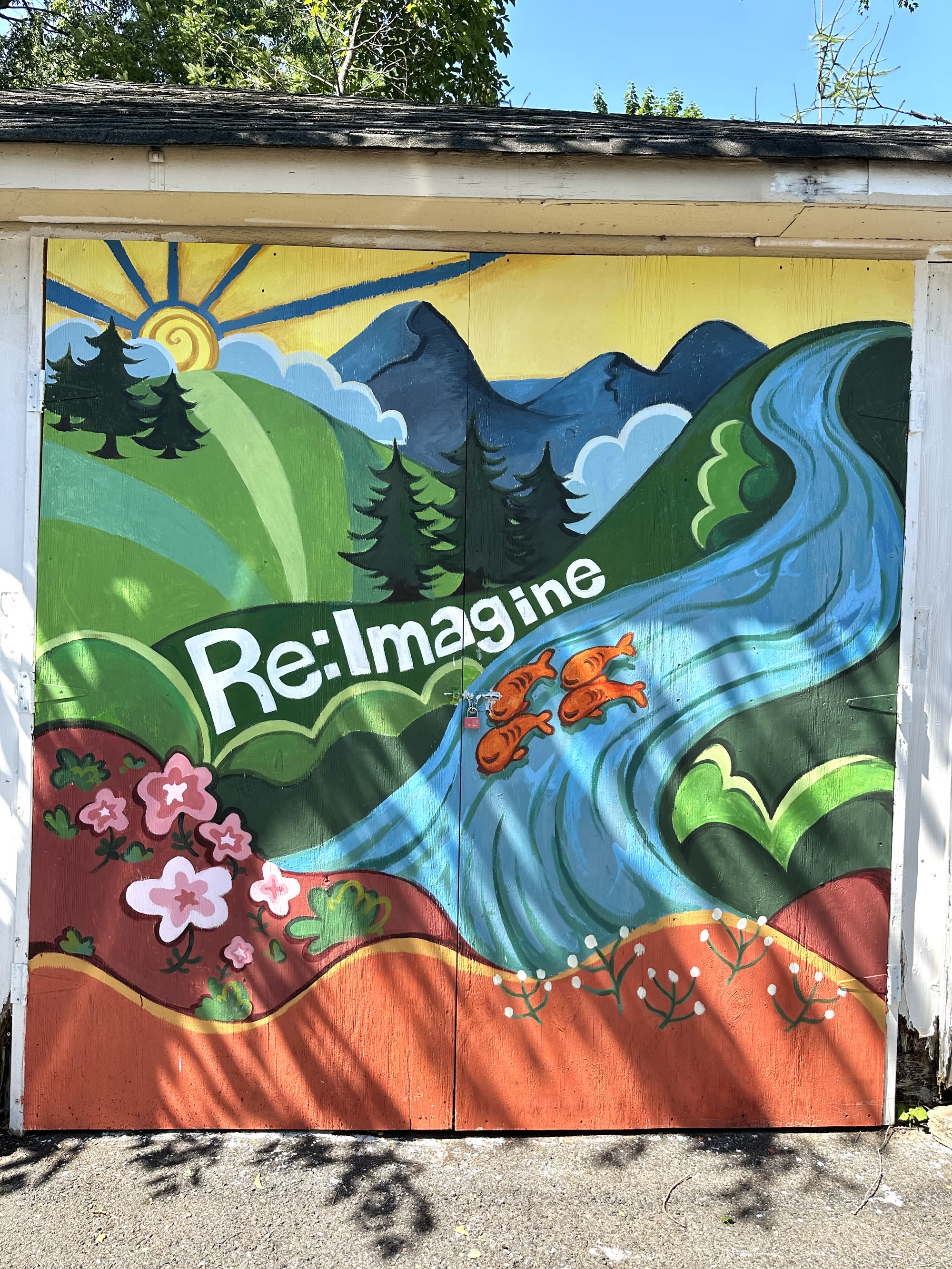 Completed Re:Imagine nature mural on the research shed doors